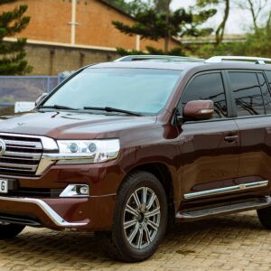 A Toyota Land Cruiser parked in an urban area, showcasing its sleek design.